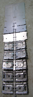 Progressive Die Strip - Automotive Roof Rail Bracket Progressive Die Strip